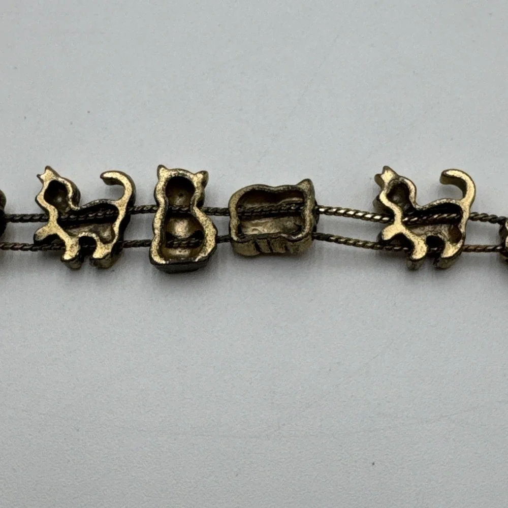 Vintage Avon Gold Tone Sliding Cat Charm Bracelet Rhinestone Red Heart Marked SP